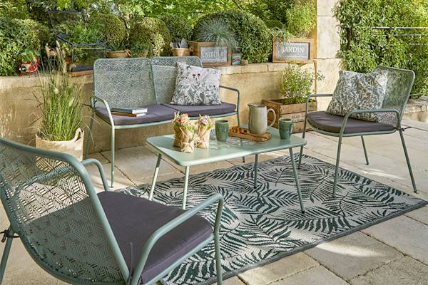 Salon de jardin en métal avec coussins gris uni et à motif floral