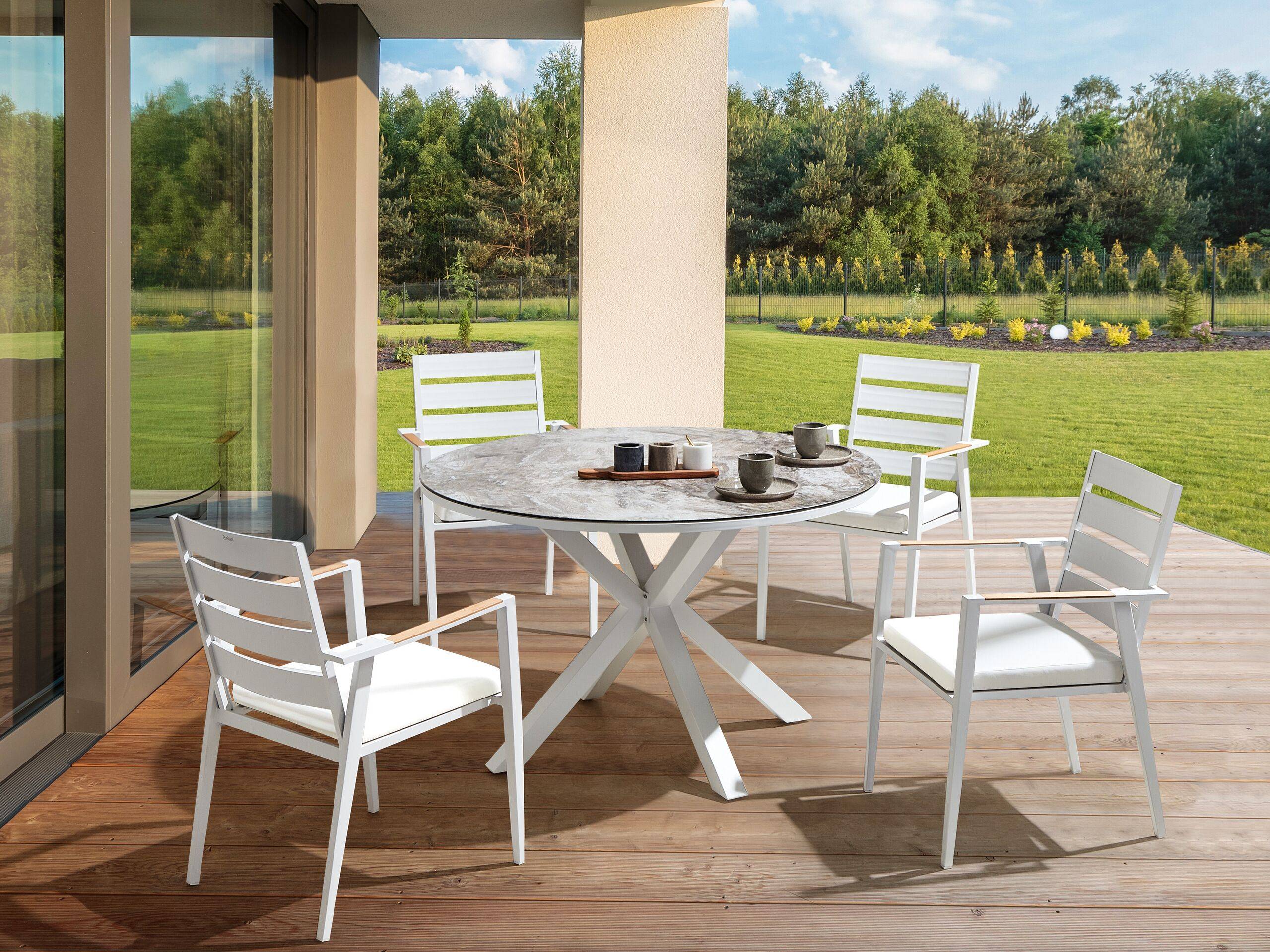 Beliani - Salle à Manger de Jardin Blanc en Aluminium Table Ronde Effet Marbre avec 4 Chaises et Coussins Pour Repas Convivial en Extérieur - Imagen 2