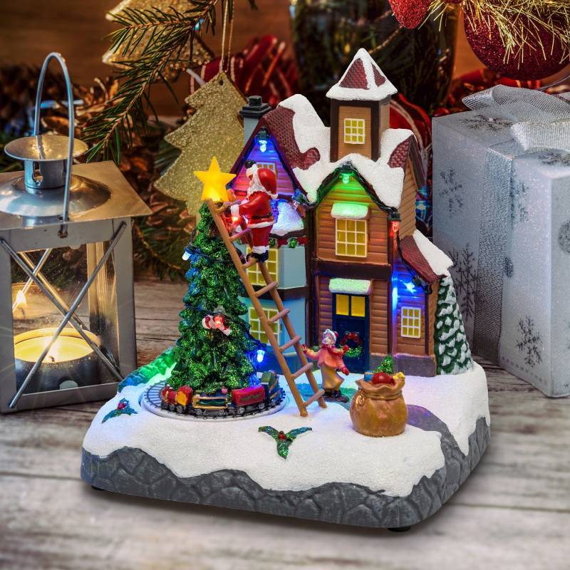 Lotti - Village de noël lumineux animé Père Noël sur échelle et Petit Train Tournant LED Musique Lotti - Imagen 3