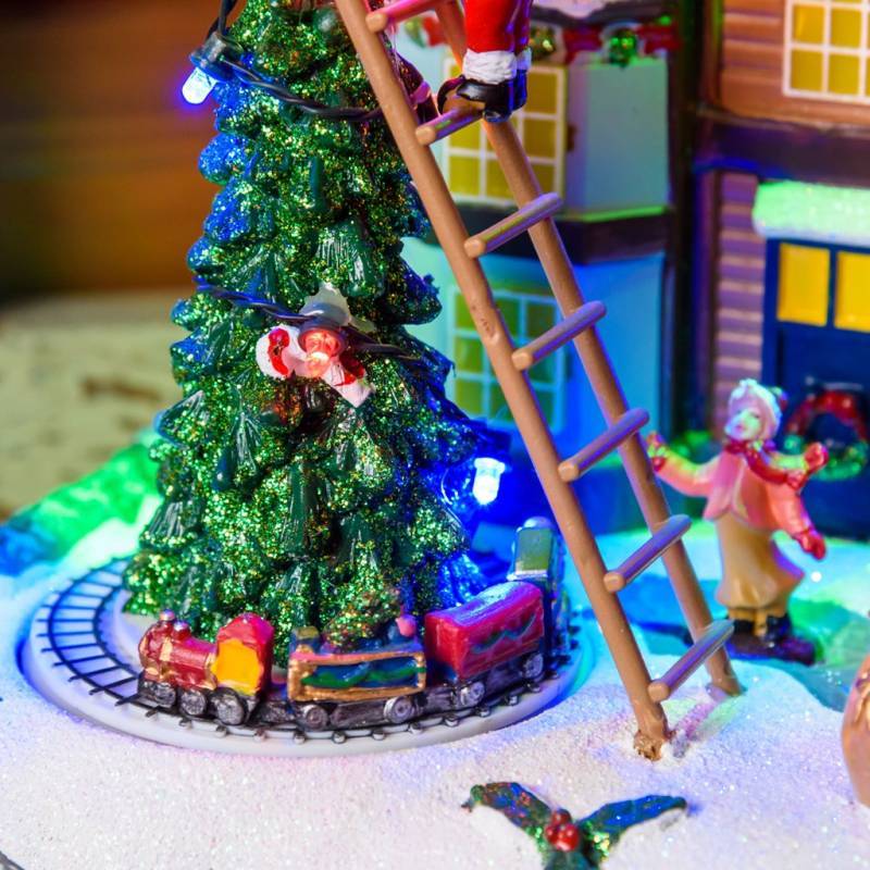 Lotti - Village de noël lumineux animé Père Noël sur échelle et Petit Train Tournant LED Musique Lotti - Imagen 5
