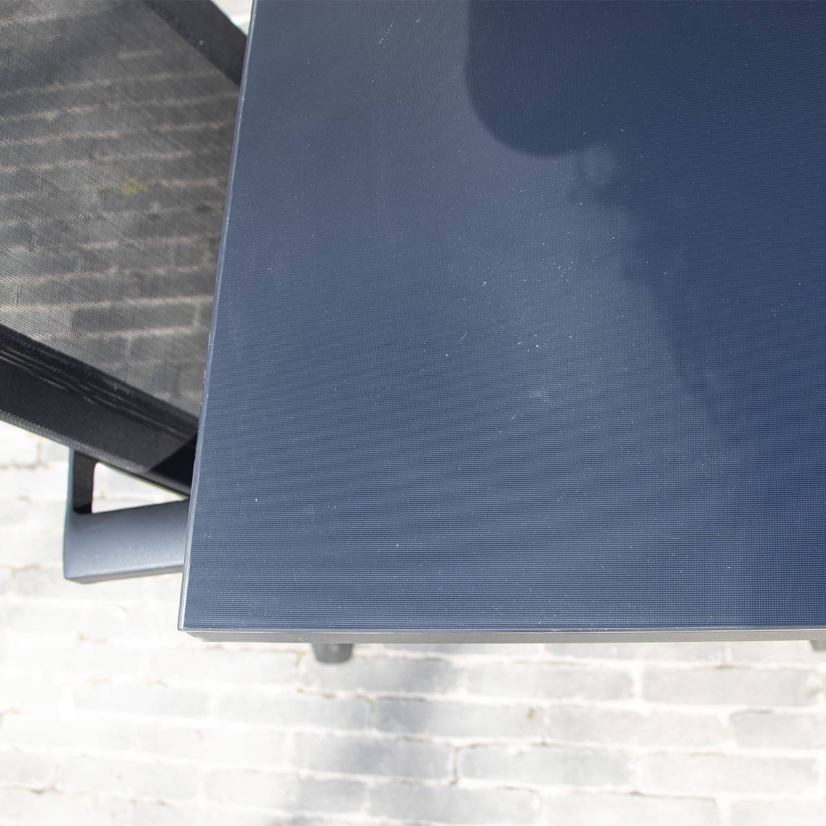 Wilsa Garden - Ensemble BLACKSTAR 8/12p en aluminium noir et verre noir avec 8 fauteuils en textilène - Imagen 3