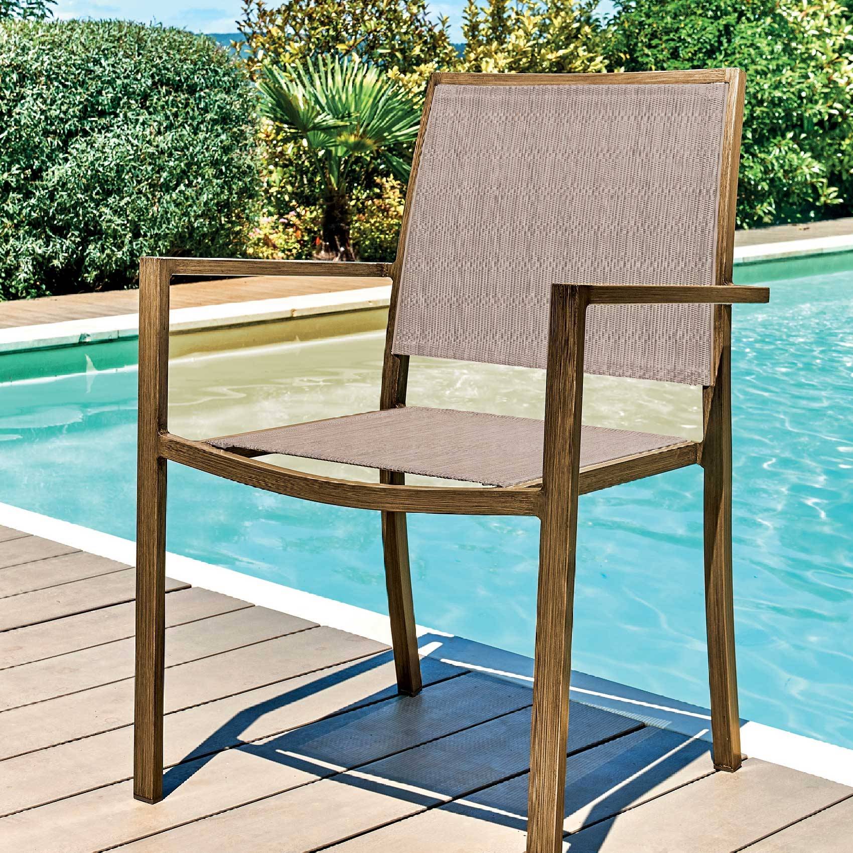 Fauteuil empilable en finition teck recyclé - JARDILINE - Imagen 1
