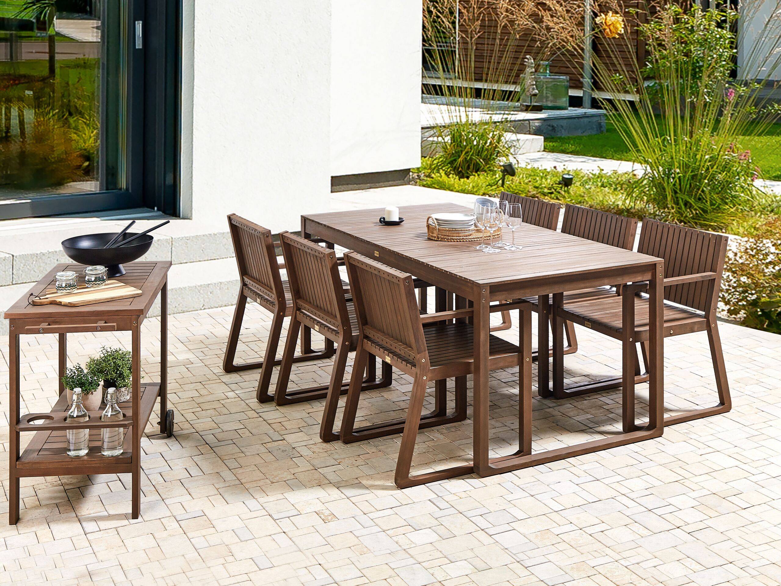 Beliani - Ensemble de Jardin en Bois d'Acacia Foncé 180 x 90 cm Table et 6 Chaises avec Chariot à Roulettes Mobilier Extérieur Rustique - Imagen 2