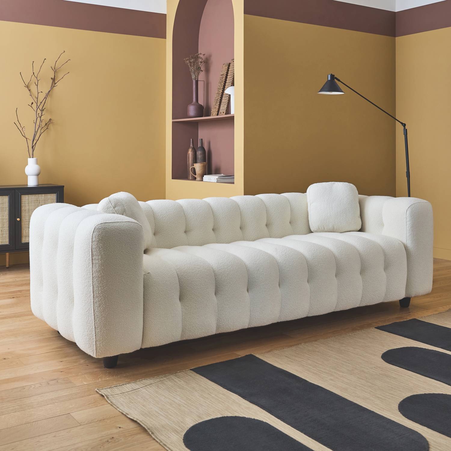 sweeek - Canapé 3 places en bouclette texturée capitonné blanc crème - Structure bois d'eucalyptus et contreplaqué  | sweeek - Image 1