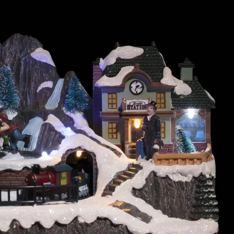 Feeric Christmas - Village lumineux gare et patineurs 9 LED l.23cm musical - Feeric Lights & Christmas - Imagen 2