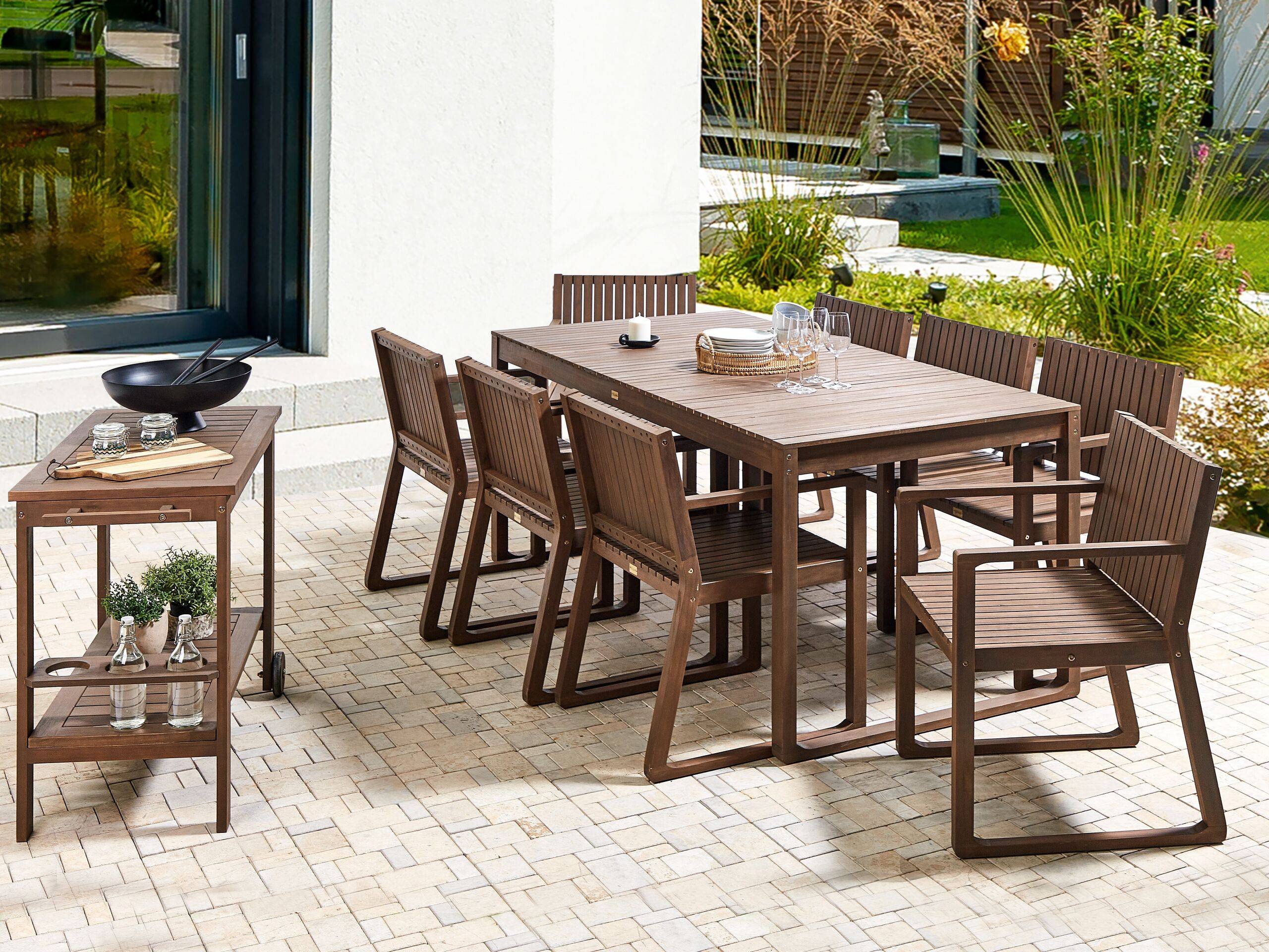 Beliani - Ensemble de Jardin en Bois d'Acacia Foncé 180 x 90 cm Table et 8 Chaises avec Chariot à Roulettes Mobilier Extérieur Rustique - Imagen 2