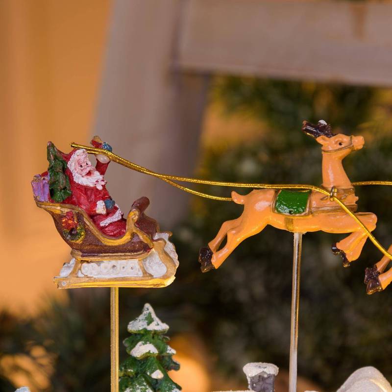 Lotti - Village de Noël LED Enneigé avec Eglise Père Noël sur Traineau Volant avec Rennes en Mouvement et Musique Lotti - Imagen 5