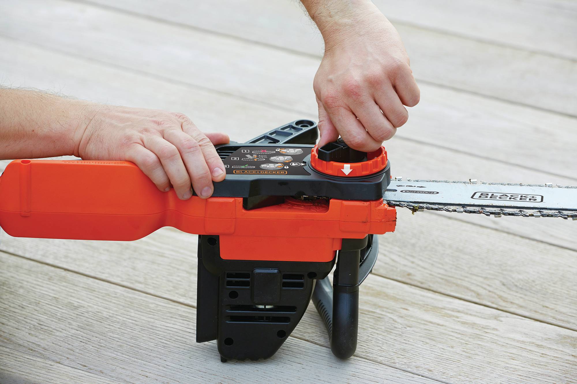 Tronçonneuse sans fil - 25 cm - 18 V - 2 Ah - 1 batterie - Double interrupteur de sécurité et protection main - Image 4
