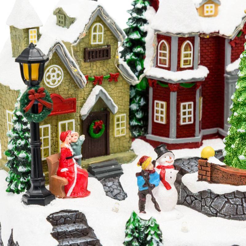 Lotti - Village de Noel lumineux avec petit train en mouvement, Personnages et Sapin en Rotation 32xH28cm avec Musique Lotti - Imagen 9