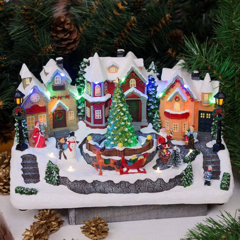 Lotti - Village de Noel lumineux avec petit train en mouvement, Personnages et Sapin en Rotation 32xH28cm avec Musique Lotti - Imagen 1