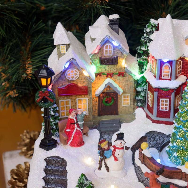 Lotti - Village de Noel lumineux avec petit train en mouvement, Personnages et Sapin en Rotation 32xH28cm avec Musique Lotti - Imagen 6