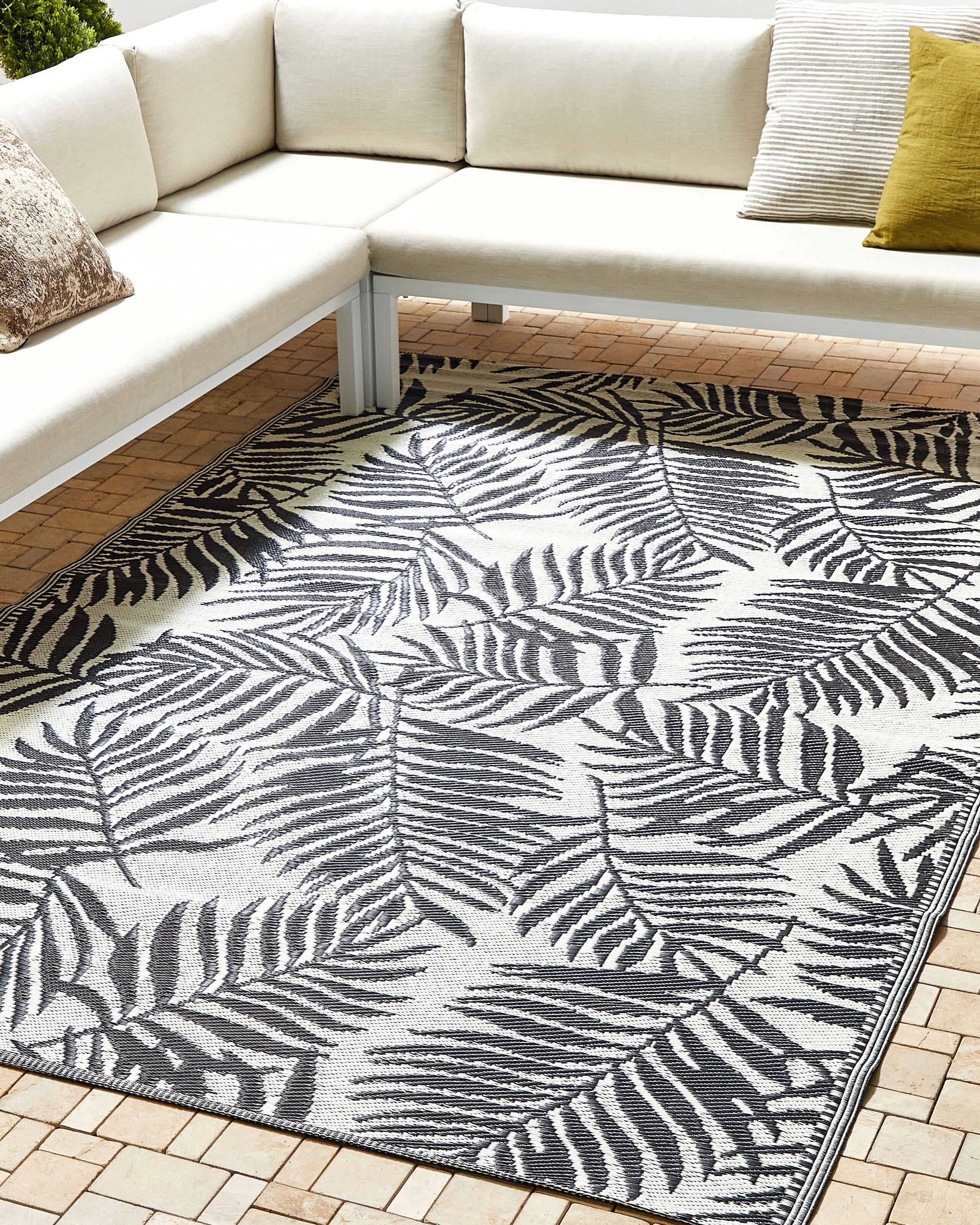 Beliani - Tapis d'Extérieur Noir et Blanc en Polypropylène Motif Feuilles de Palmier pour Terrasse au Style Moderne 180 x 270 cm Beliani - Imagen 1