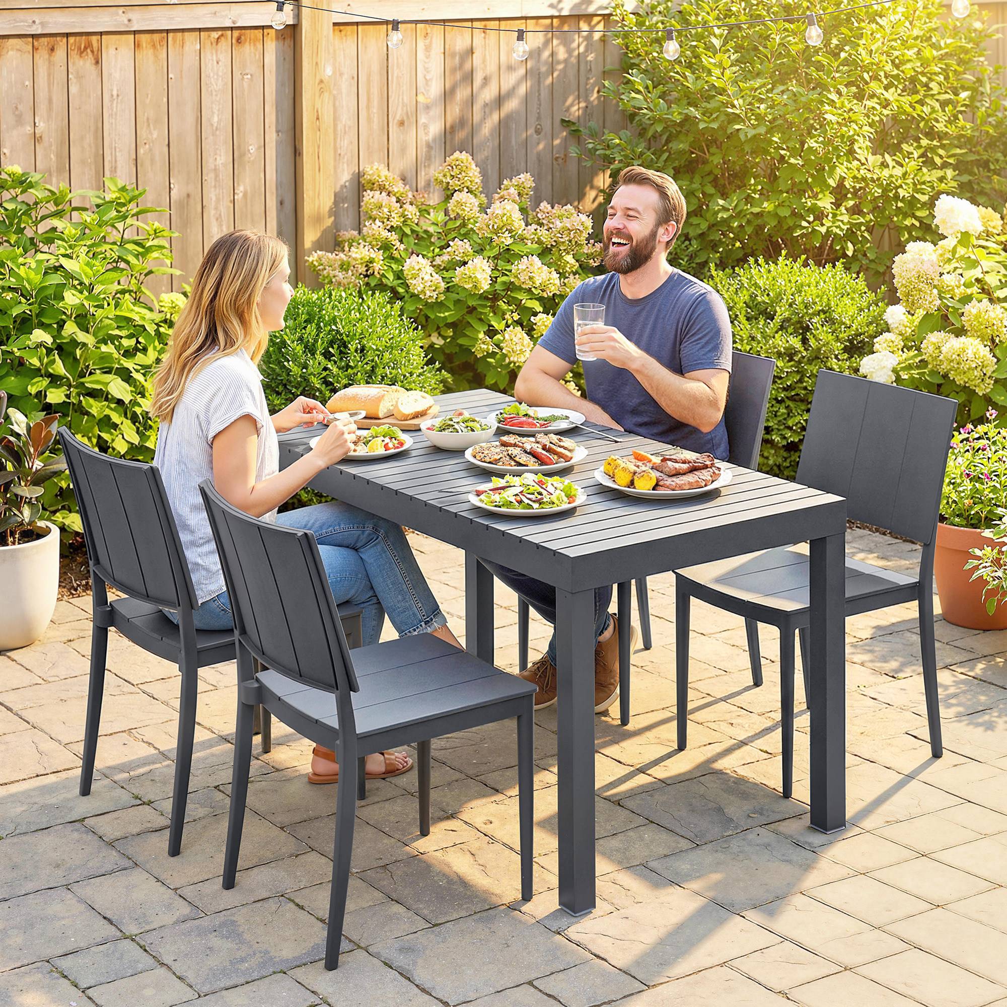 ComfortXL - Salon de jardin 5 pièces métal gris foncé table 141,5 cm 4 chaises empilables terrasse balcon gain de place - Image 9