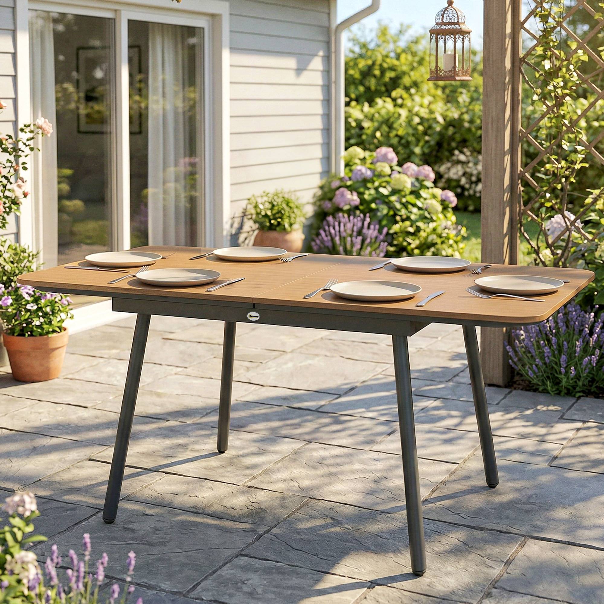 Table de jardin 140 x 80 cm pour 6 personnes, table de repas d'extérieur résistante à la rouille avec plateau en WPC, pieds réglables, teck - Image 4