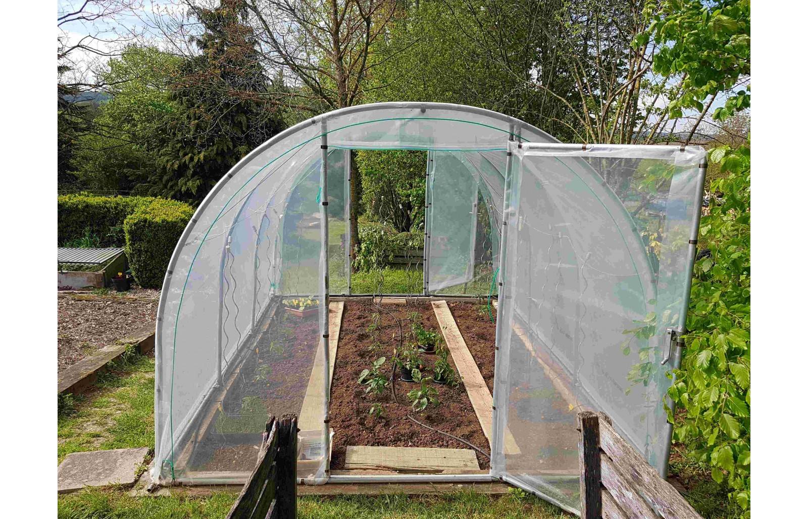Serre tunnel de jardin - 18m² - 3 x 6 m - pieds arrondis - polyéthylène haute densité - 2 portes pivotantes - LES SERRES TONNEAU - Image 1