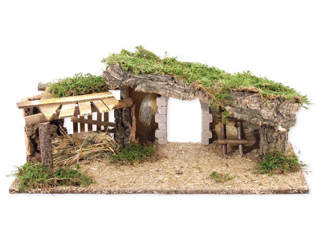Crèche vide en bois et liège avec grange et arc en plâtre.